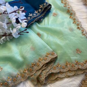 FABRIC : Pure soft twills oranga saree  BLOUSE :  rangoli heavy satin blouse With handwork